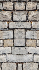 Bricklaying Construction. Brick Wall. Vertical Photo.  Grungy Ancient Rustic Vintage Shabby Antique Brickwork Facade with Aging Damaged Weathered Surface. Grunge Brickwork backdrop.