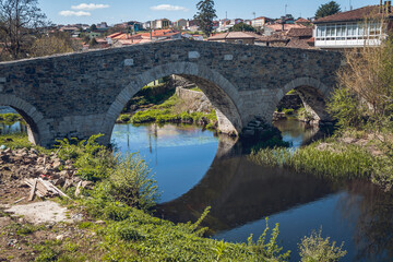 Fototapeta na wymiar Historic stone bridge near Mellid, Galicia, Spain