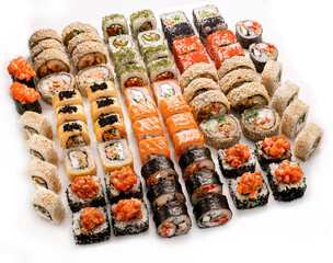 Big colorful sushi set on a white background. Top view.