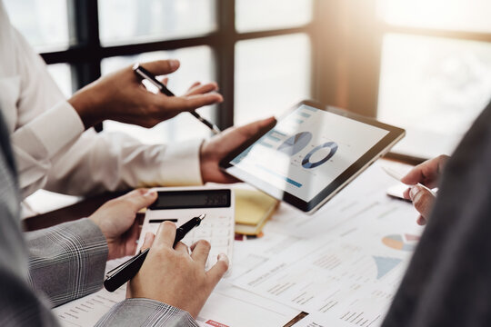 businesspeople working with partners adjusting marketing strategies