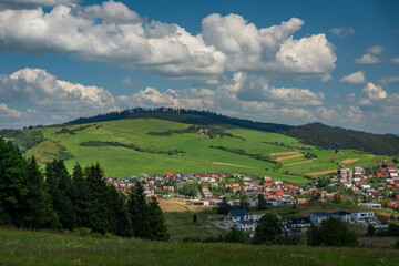Fototapeta na wymiar Tvrdosin town from hill in summer hot color day