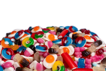 Tasty mix of jelly colorful candies isolated on a white background.