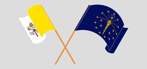 Crossed and waving flags of Vatican and the State of Indiana