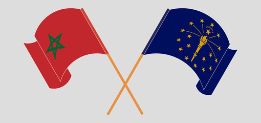 Crossed and waving flags of Morocco and the State of Indiana