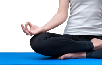 Healthy asian woman meditates while practicing yoga