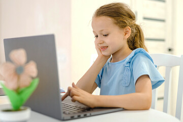 Cheerful girl having online lesson