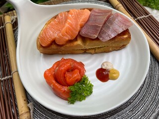 Salmon and tuna waffle with smoked salmon