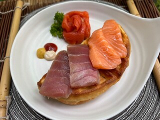 Salmon and tuna waffle with smoked salmon
