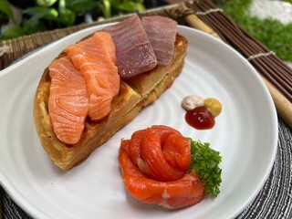 Salmon and tuna waffle with smoked salmon