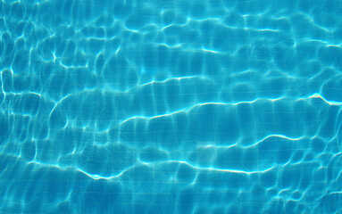 Fototapeta na wymiar Ripple blue water in swimming pool