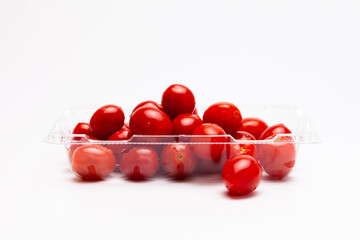Red ripe cherry tomatoes with water drops