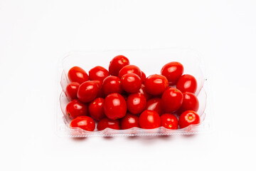 Red ripe cherry tomatoes with water drops