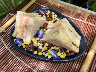 Salmon with boiled egg sandwiches and corn mixed red bean