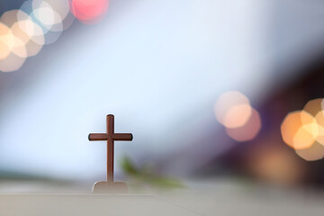 Bright light background with bible and crucifixion of Jesus Christ and light bokeh background
