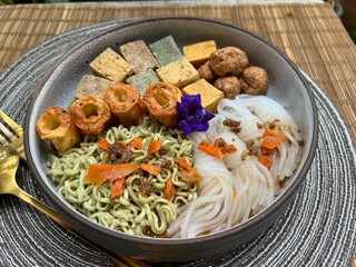 Various tofu and vegetable noodle with fish balls