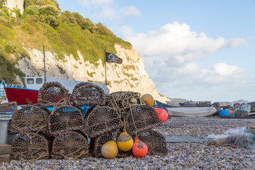 Lobster or crab or prawn pots stacked on the beach
