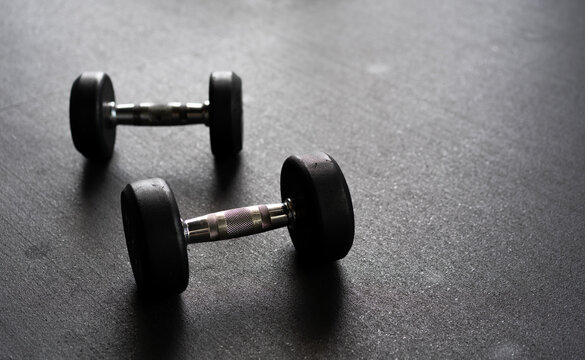 dumbbell on black background, Dumbbells on dark background, fitness equipment