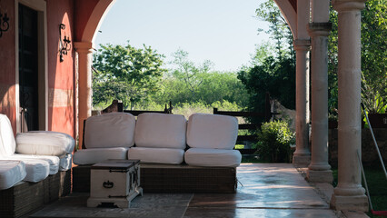 sofas on the terrace patio of a hacienda, Mexico