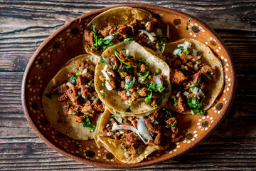 Mexico food, tacos, wooden background, natural light.