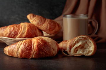 Croissants and coffee with cream.