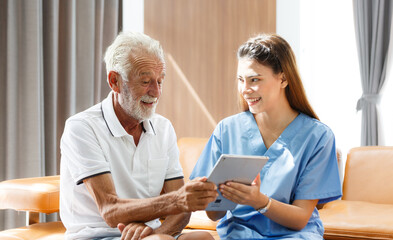 professional female doctor using digital tablet medical test results senior male patient explaining prescription