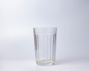 Empty glass on white
