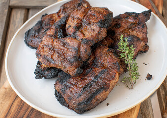 Grilled pork steaks on a plate
