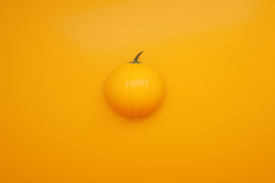 pumpkin on orange background, 3d render, halloween minimalist background