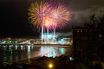 Fototapeta premium Fireworks in Concha Beach in San Sebastian, Basque Country, Spain