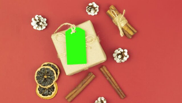 Box with twine and tag, background with copy space. Chroma key. Christmas card. View from above. Copy space - image. Camera zoom