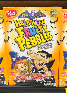 Alameda, CA - August 5, 2022: Grocery Store Shelf With Boxes Of Post Brand Fruity Pebbles Cereal. Featuring The Flintstone Characters, Pebbles And Fred.