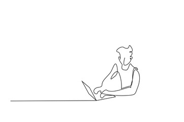 a person using a laptop in a relaxed way