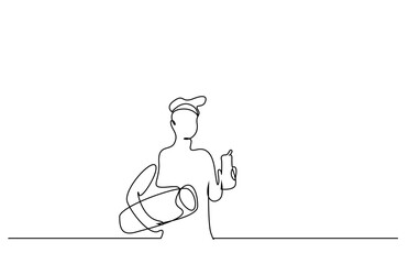 a young fit male holding a water bottle and a mat healthy lifestyle concept