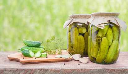 Two cans of pickled cucumbers and other ingredients