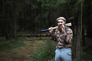 A bearded lumberjack with a large ax