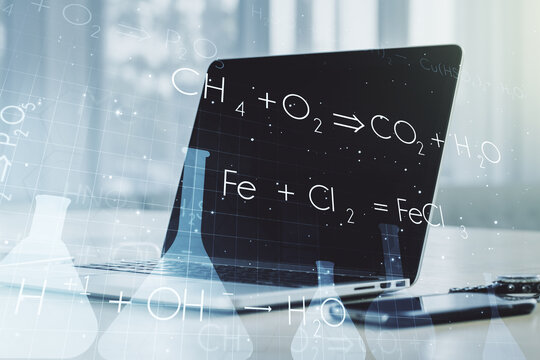 Creative chemistry concept on modern laptop background. Multiexposure