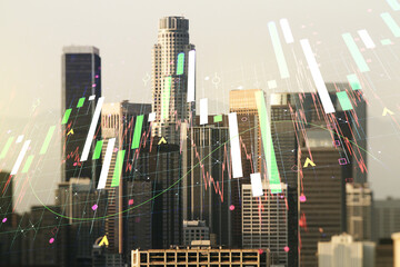 Double exposure of abstract creative financial chart hologram on Los Angeles skyscrapers background, research and strategy concept