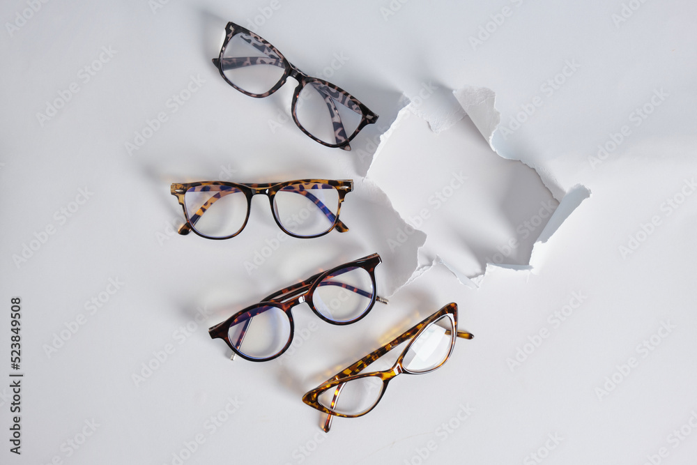 Wall mural fashion eye glasses in light gray background