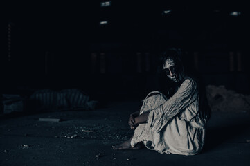 Portrait of asian woman make up ghost,Scary horror scene for background,Halloween festival concept,Ghost movies poster