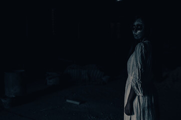 Portrait of asian woman make up ghost,Scary horror scene for background,Halloween festival...
