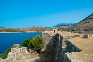 Foto op Plexiglas Walls of an old fortress Ali Pasha Tepelena Fortress Porto Palermo near Himare city located on a peninsula in the bay of the Ionian Sea. Albania © jana_janina