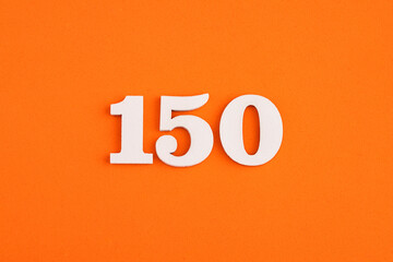 Number 150 - On orange foam rubber background