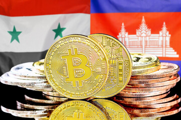 Bitcoins on flag Syria and Cambodia background. Concept for investors in cryptocurrency and Blockchain technology in Syria and Cambodia