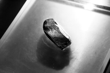 Silex stone on metal background