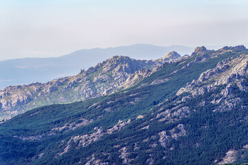 Fototapeta na wymiar Panoramic view of the mountain range layered in the Community of Madrid, Spain.