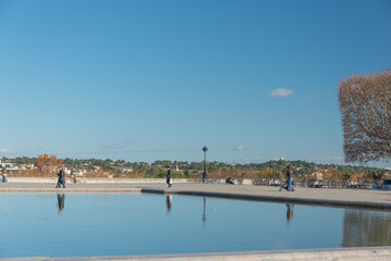 triumphal arch and fountain in Montpellier france park in autum with clear sky royal park of Louis XIV