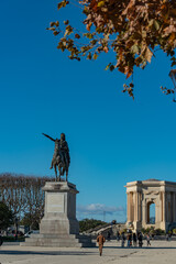 Statue of Louis XIV in Montpellier france park in autum with clear sky royal monarch