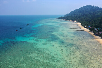 Tioman tropical island drone photo with beautiful blue sea and sky. South china sea Southeast Asia.
