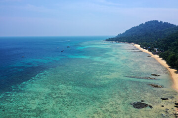 Fototapeta na wymiar Tioman tropical island drone photo with beautiful blue sea and sky. South china sea Southeast Asia.