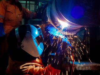 welder welding steel